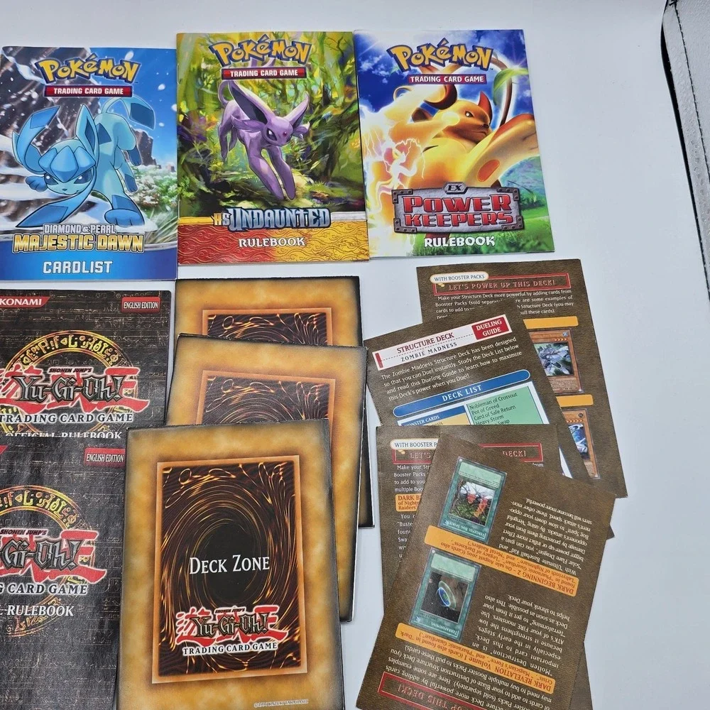 Lot Of Pokémon‎ And Yu-gi-oh RuleBooks Card Lists Deck Zones